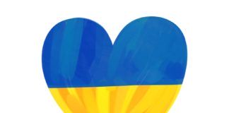 Jednorazowe świadczenie pieniężne. Na białym tle umowny kształt serca w barwach ukraińskiej flagi. Niebiesko żółte.