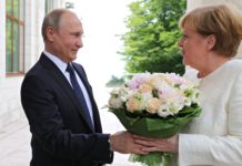 Angela Merkel i Vladimir Putin. Rosja zbroi się
