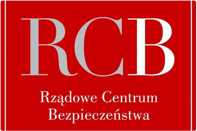 Rządowe Centrum Bezpieczeństwa - nowe zalecenia. Na czerwonym tle duże litery RCB oraz poniżej rozwinięcie Rządowe Centrum Bezpieczeństwa.