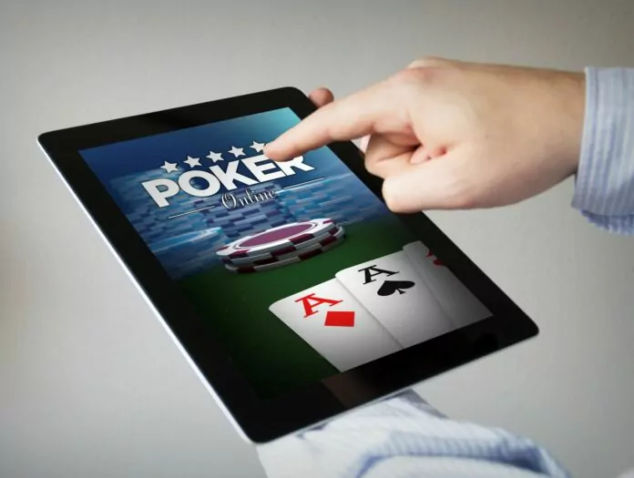 Gra w kasynie podczas podróży jak na zdjęciu widać na tablecie.