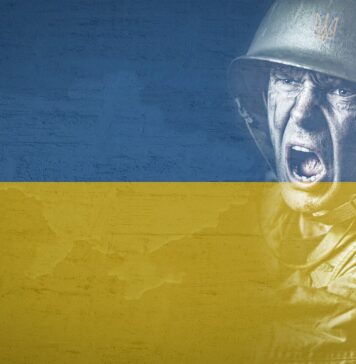 wojska NATO w Ukrainie, żołnierz na tle flagi Ukrainy